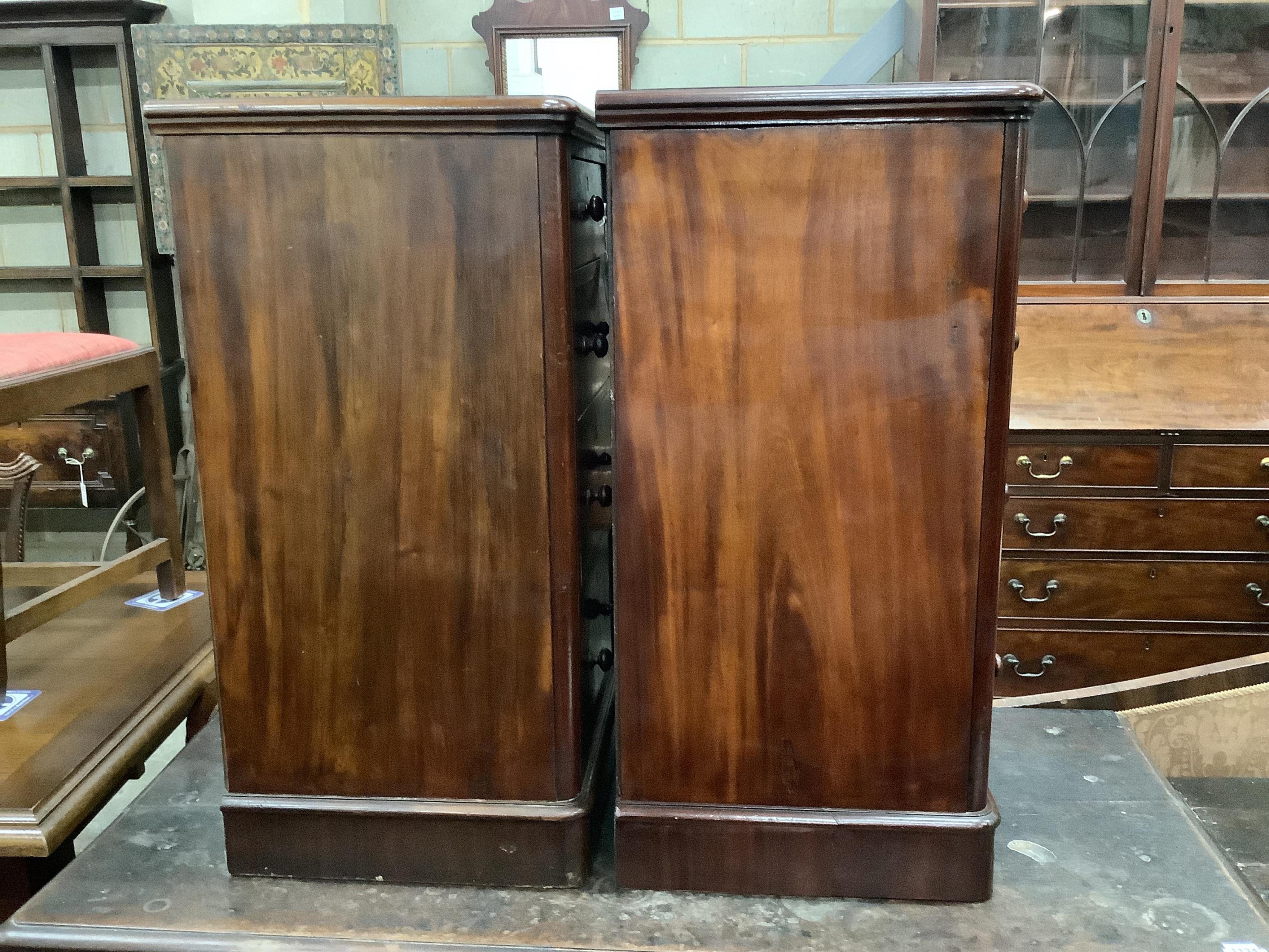 A pair of Victorian and later mahogany four drawer bedside chests, adapted, width 42cm, depth 40cm, height 81cm. Condition - good.